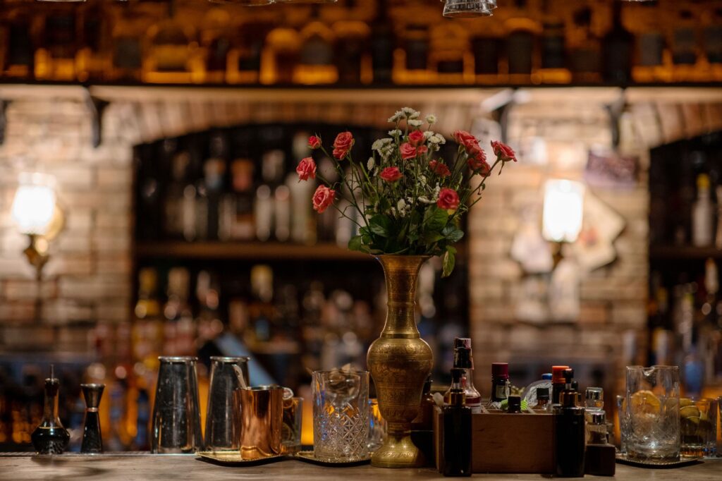 Cocktail bar with mixed drinks and bottles